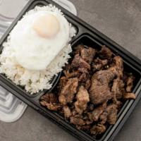 Tapa Egg & Rice · Slices of thin tender marinated fried beef, served with rice and fried egg
