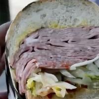 Italian Hero · Mortadella, capicola, salami cotto, provolone, lettuce, tomato, pickle, onion, mayonaise, mu...