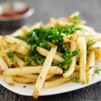 Truffle Fries · Tasty Truffle Fries tossed with Truffle oil and fresh thyme. Served with ketchup.
