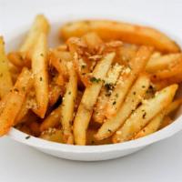 Garlic Parmesan Fries · Savory fries hand-tossed in house-made garlic parmesan sauce and served with ketchup.