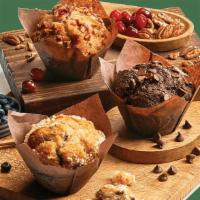 Muffins · One look at our muffins and you will fall in love.  Baked fresh you can choose from an assor...