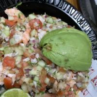 Shrimp Ceviche · Shrimp cooked then marinated with lemon juice, cilantro, onions, cucumber and tomatoes ontop...