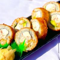 Golden Tiger Roll · Inside:  2 Shrimp Tempura, Avocado, Imitation Crab
Outside : Eel Sauce, Spicy Mayo