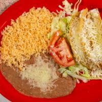 Krispy Taco Dinner · Two krispy tacos, meat, beans, rice, cheese, sour cream, lettuce and tomato salsa.
