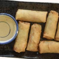 Crunch Veg Spring Rolls · Crunchy vegetables rolls, comes with sweet and sour sauce.