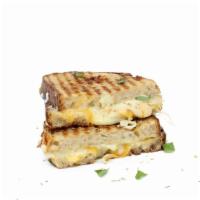 4 Cheese Grilled Cheese · Toasted sourdough with cheddar, swiss, provolone and mozzarella cheeses.