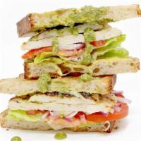 Chicken Pesto · Grilled chicken breast, pesto mayo, lettuce, tomato. Herbed vinaigrette. Served on a French ...