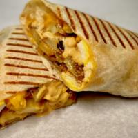 Meatless Chipotle Breakfast Burrito · Breakfast potatoes, cheddar cheese, egg, chipotle mayo. Flour tortilla.