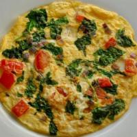 Veggie Omelette · Tomato, spinach, mushrooms, green pepper, diced onion and cheddar cheese. Served with your c...