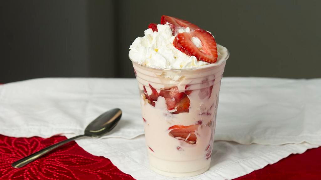 Fresas  Con  Crema 16 Oz · 16 oz cup layered with fresh strawberries and our homemade cream which is then topped with whipped cream.