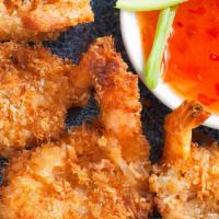 Coconut Shrimp · Deep-fried coconut breaded shrimp. Served with  lime and chili dipping sauce.