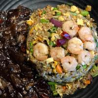 Fried Rice · Fried rice with shrimp, egg, corn, peas, onion, green onion, and cabbage. Served with black ...
