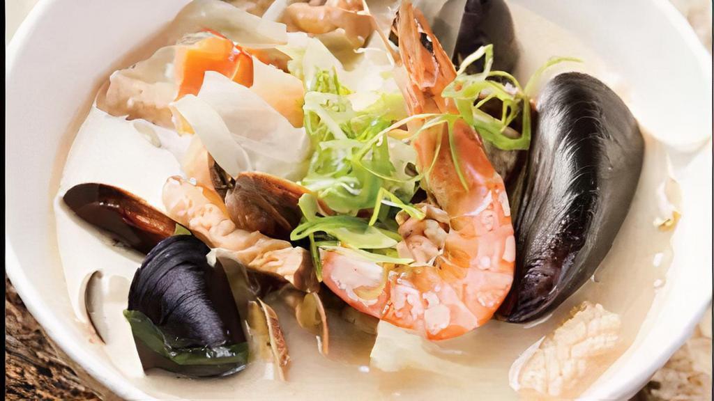 White Jjam-Ppong-Bap · Non-spicy seafood soup with pork, shrimp, mussel, mitra squid, shiitake, wood-ear mushroom and vegetables. Served with rice.