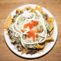 Nacho With Meat · Beans meat onion cilantro mix salsa guacamole cheese tomatoes sour cream