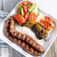Beef Luleh Kabob · Served with rice, green salad, hummus and grilled tomato/pepper