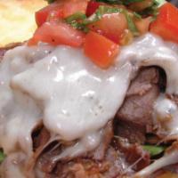 Tri-Tip Steak Sandwich · Roasted tri-tip steak, bell pepper, onion, provolone cheese, lettuce, tomatoes and mayo on g...