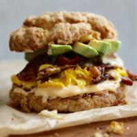 The Breakfast Club* · fried egg, smoked bacon, avocado, cheddar, spicy mayo, buttermilk biscuit, choice of hash br...