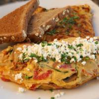 Veggie Omelet · mozzarella, roasted red bell peppers, baby spinach, mushrooms, onions, basil, fresh tomatoes...