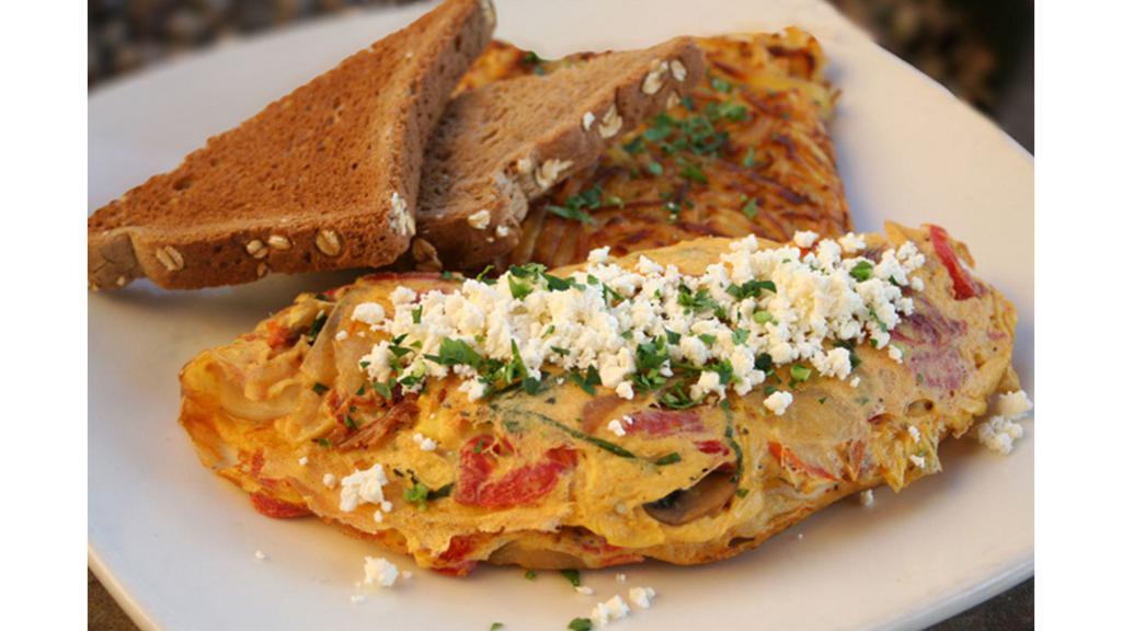 Veggie Omelet · mozzarella, roasted red bell peppers, baby spinach, mushrooms, onions, basil, fresh tomatoes, feta, toast, choice of hash browns or watermelon [820/1260 cal]  .