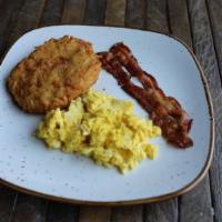 Kids Top Dog Breakfast · 2 scrambled eggs, 2 pieces of bacon + hash browns [510 cal]