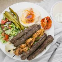 Mix Kabab · Lamb mix with parsley and chunks of chicken barbecued served with hummus, rice, salad, fresh...