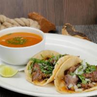 2 Birria Tacos · Maria's famous. 2 goat meat tacos with hand-made tortillas with a cup of consome.