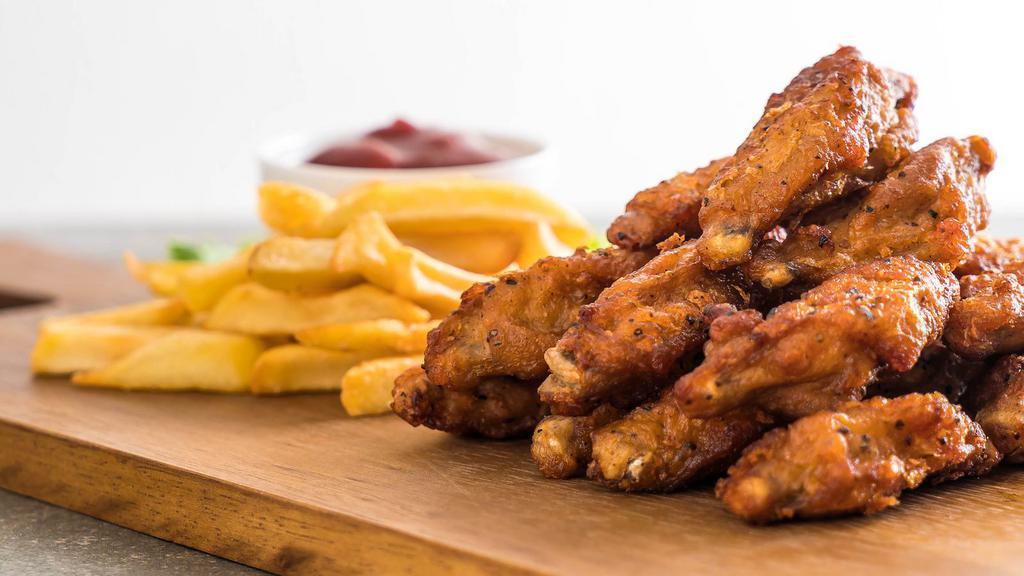 Chicken Wings With Fries · Tender, juicy chicken wings with your choice of dip and a side of fries.