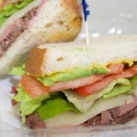 Sandwiches · Mayonnaise, Lettuce, Tomato, Onion on white, multigrain or sourdough bread.