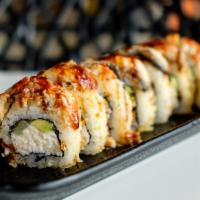 Dragon Roll · California roll topped with eel, crunchy flake, sweet sauce.