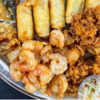 Crispy Seafood Plate · Red snapper fillet, shrimps, calamaris and fish balls.