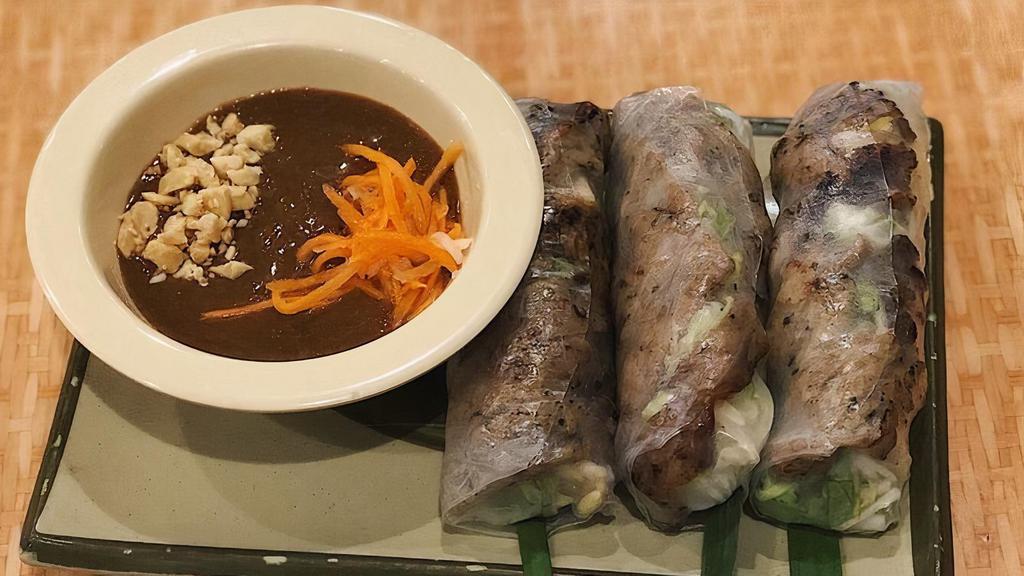 Imperial Pork Rolls (Cha Gio) · 5 fried pork rolls served with dipping sauce and herbs.