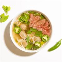 Comination Pho · Ribeye with beef meatballs with rice noodles and house broth.