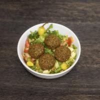 Falafel Salad Bowl · Mixed greens, tomatoes, cucumbers, onions. Served with balsamic vinaigrette and tahini sauce.