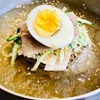Cold Noodle 물냉면 · Buckwheat noodle with cold both(broth that made of radish water kimchi)

얼음 동동 동치미육수와 특제소스로 ...