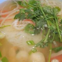 #28 Seafood Noodle Soup · Shrimp, imitation crab meat, fish cake and squid.