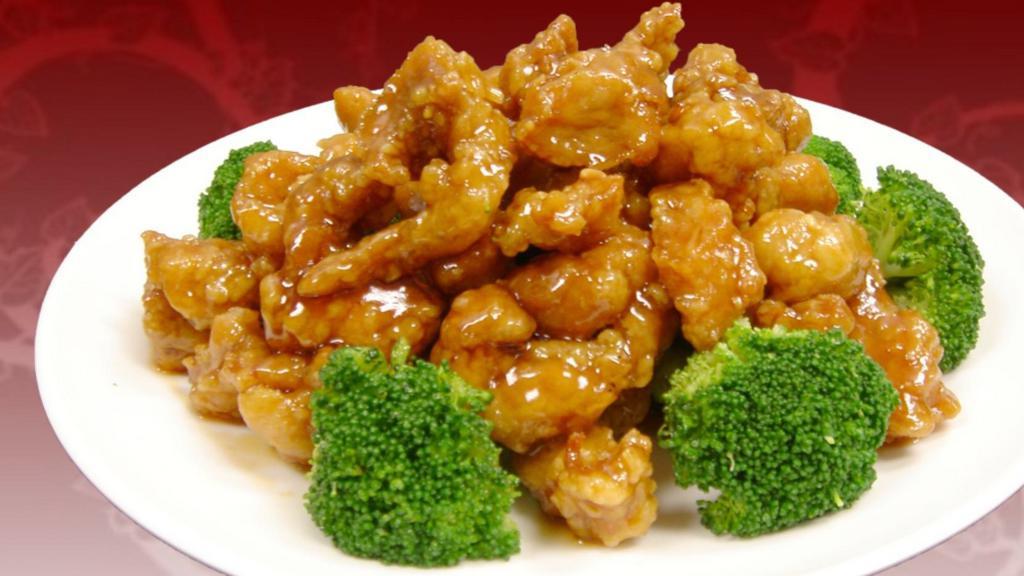 Orange Chicken · Fried chicken stir-fried with our spicy and tangy Orange sauce. Comes with broccoli.