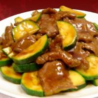 Zucchini Beef · Stir-fried beef with zucchini in a savory black bean sauce.