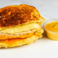 Roasted Turkey & Three Cheese Melt · Roasted turkey, Gruyère, White Cheddar & American cheeses melted between buttery, toasted so...
