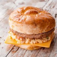 Ranchero Egg & Sausage Biscuit · Mexico city style house made toasted butter biscuit, farm fresh eggs, sharp cheddar cheese, ...