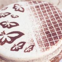 Tiramisu Cake · Vanilla Sponge Cake filled with Espresso Infused Sweet Cream Cheese, topped with Vanilla Bea...