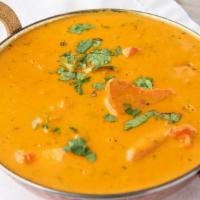 Chicken Tikka Masala · Boneless chicken breast pieces served with a tomato and creamy sauce.