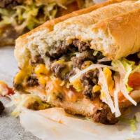 Ny Chopped Cheese · 1/3 lb  Beef, Caramelized Onions + Peppers, Cheese, Lettuce, Tomato, Pickles, Chipotle Aioli...