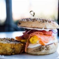 Smoked Salmon Eggwich · 1 Egg any Style, Heirloom Tomato, Red onion, Capers, Cream Cheese, Everything Bagel
