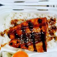Salmon Teriyaki Plate · Grilled salmon served with white rice and steamed vegetables topped with teriyaki sauce and ...