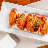 Knotty Wings · Served with buttermilk ranch.  Choice Of:  Traditional Buffalo, Dry Rub,  Sweet Chili, or Le...