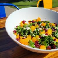 Kale & Beet Salad · Black kale, Golden Beets, Goat Cheese, Dried Cranberries, Pepitas, Maple & Lemon Vinaigrette