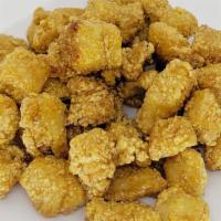 Honey Popcorn Chicken · You get our famous popcorn Chicken, white meat.  And then we toss it in a wok and glaze it w...