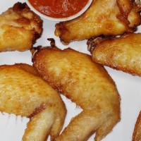 Fried Chicken Wings (5 Pieces) · Full sized wings fried and seasoned.  Original ( Salt Pepper seasoning.  Red Hot ( Red Hot S...