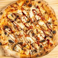 Shroomin  · Garlic sauce, mozzarella, mushrooms, lingucia sausage ,fresh mozzarella , truffle glaze