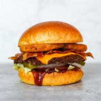Bbq Bacon Smash Cheeseburger · Juicy, grilled beef burger smashed to perfection with American cheese, smoked bacon, crispy ...